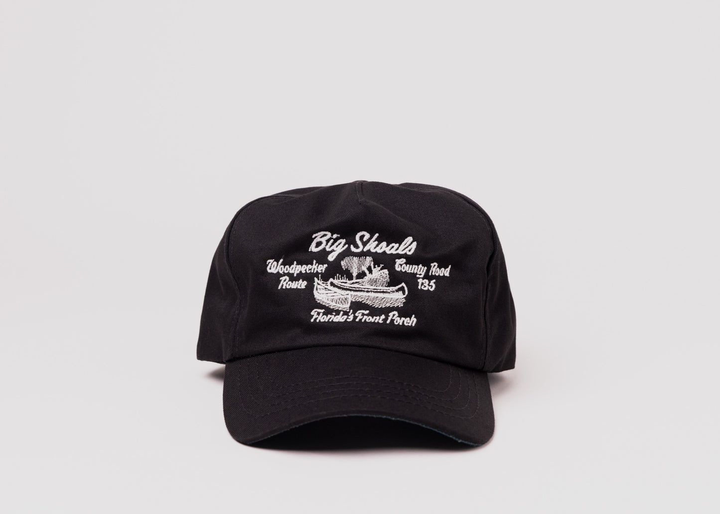 Black Besco hat with white embroidered ‘Big Shoals’ and canoe design, front view on white background.